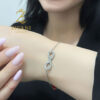 دستبند نقره زنانه بی نهایت و پروانه زنجیری