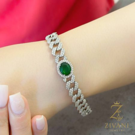 دستبند نقره کارتیه زنانه کد zi-b-41 نگین بیضی سبز