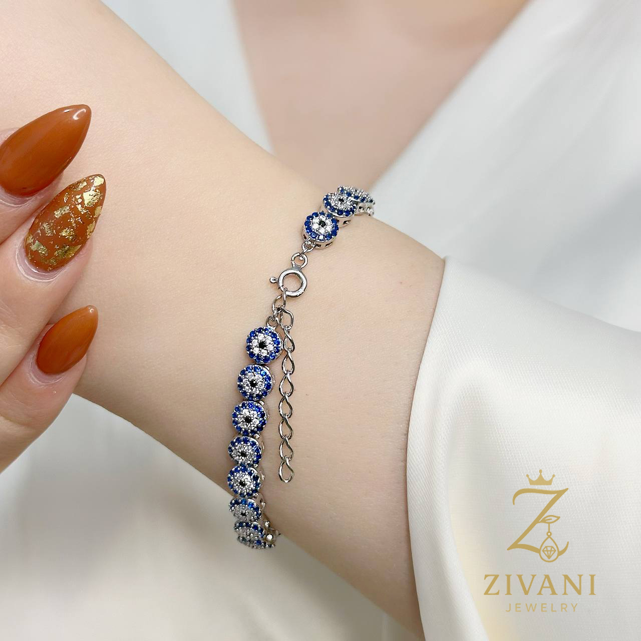 دستبند نقره زنانه چشم نظر بند ساعتی zi-b-67 از قفل