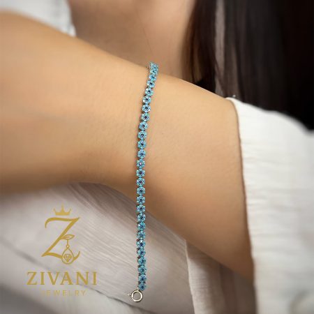 دستبند نقره زنانه فلاور فیروزه ای روی دست